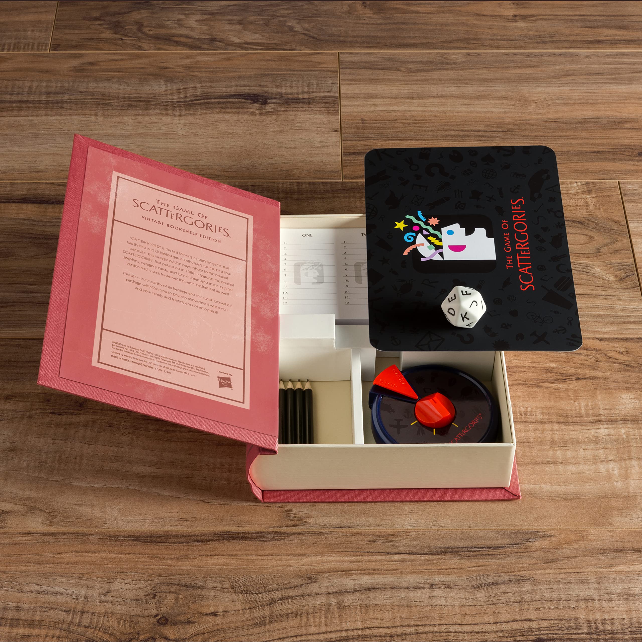 WS Game Company Scattergories integrated storage keeps game pieces organized after play.