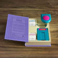 WS Game Company Taboo Vintage Bookshelf Edition—slipcover protects and blends with decor.