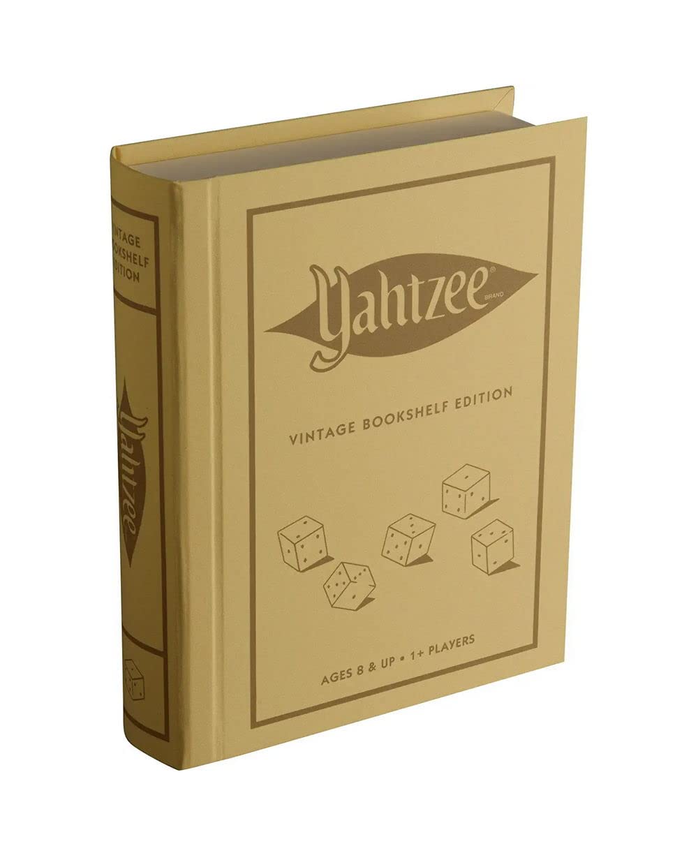 WS Game Company Yahtzee linen bookshelf edition cover on a shelf, a stylish game centerpiece.
