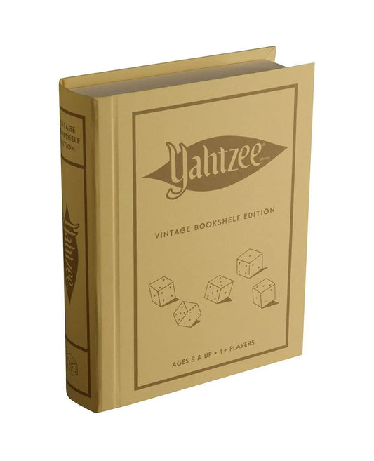 WS Game Company Yahtzee linen bookshelf edition cover on a shelf, a stylish game centerpiece.