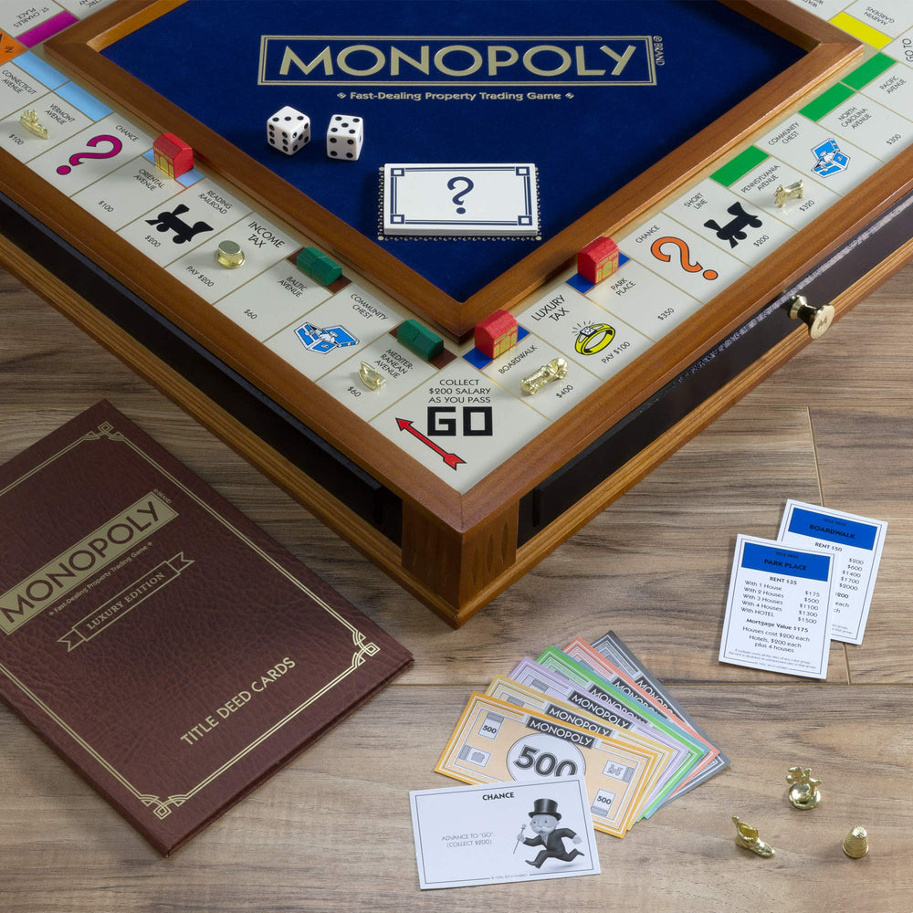 Solid wooden houses and hotels with gold foil tops add prestige.