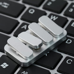 WSHWXY metal fidget slider closeup shows refined finish and detail.