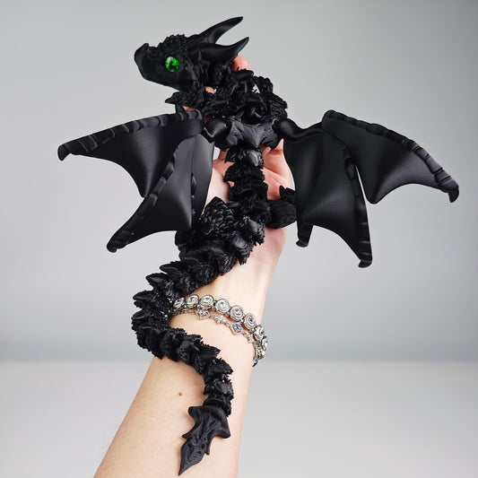 WUQIREN dragon with wings in matte black enhances desk decor and fantasy vibes.