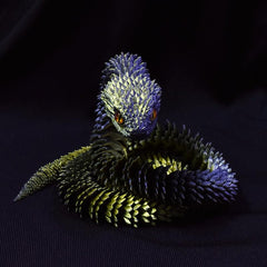 WUQIREN 18-inch display-ready snake for home or office decor.
