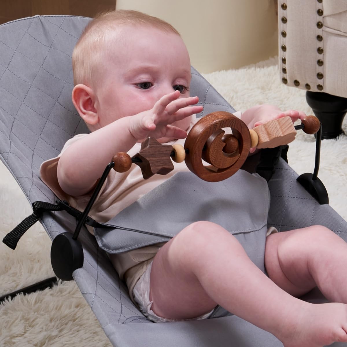 Rotatable WYFWFDF Toy Bar enables varied play angles for baby exploration.