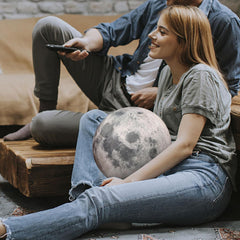 XIGUI Moon plush toy, a comforting study buddy for space-themed learning and bedtime stories.