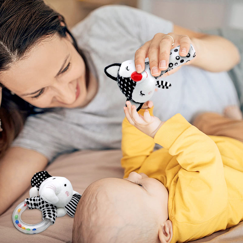 XIXILAND baby hand grasping the rattle for easy handling