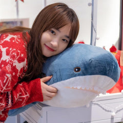 XIZHI giant shark plush on bed decor creates a friendly focal point.