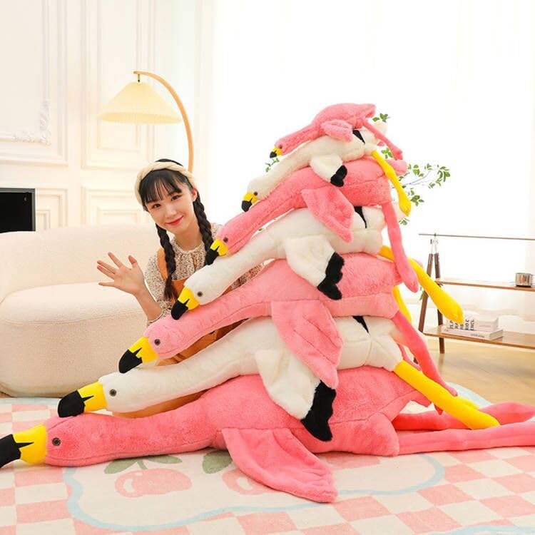 XQEYNT flamingo plush as travel companion for breaks and study sessions.