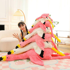 XQEYNT flamingo plush as travel companion for breaks and study sessions.