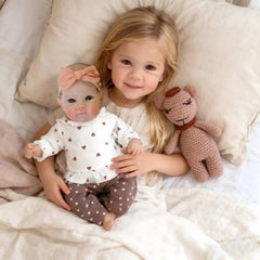 XSWPL Bettie cloth body doll ready for cuddly play