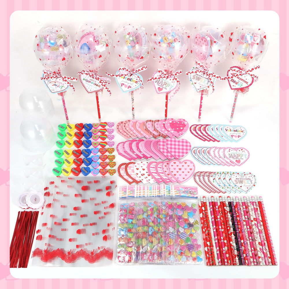 Yaeyia lollipop display includes heart cards and notebooks for classroom celebrations.