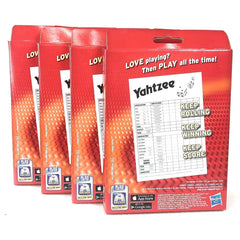 Yahtzee score cards in use to track rounds with clear labeling and quick reference.