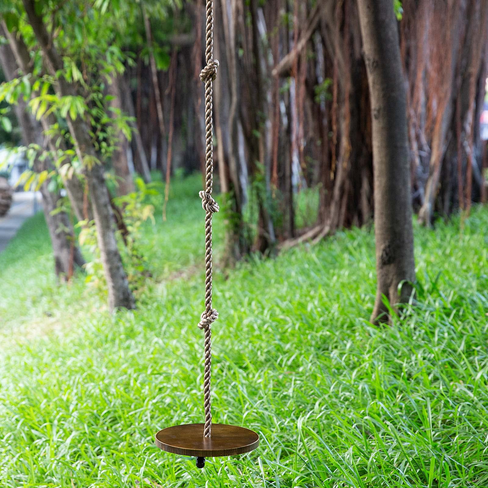 Yangbaga outdoor swing in use by child on a sunny backyard day