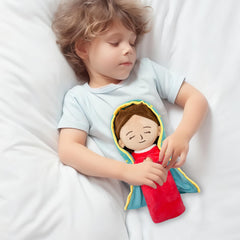 Mary plush on a tabletop decoration, adding warm decor notes.
