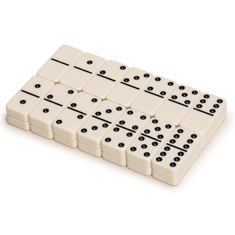 Close-up of domino tiles with etched black pips for clarity