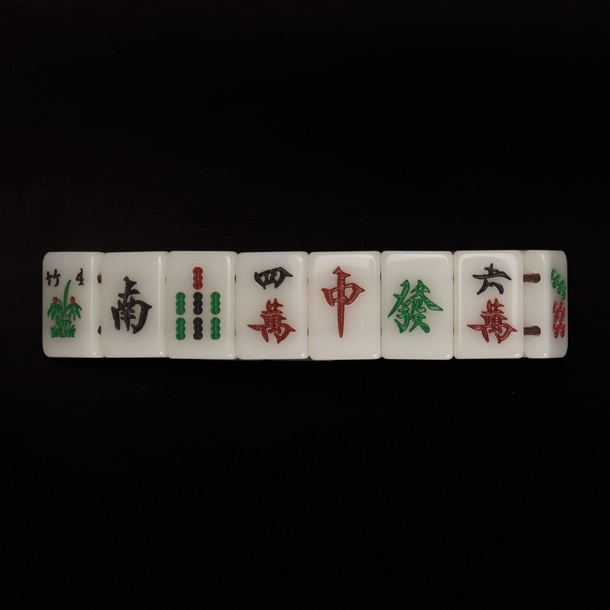 Yellow Mountain Imports Mahjong Mini-Tiles Bracelet tiles close-up, scratch-resistant acrylic.