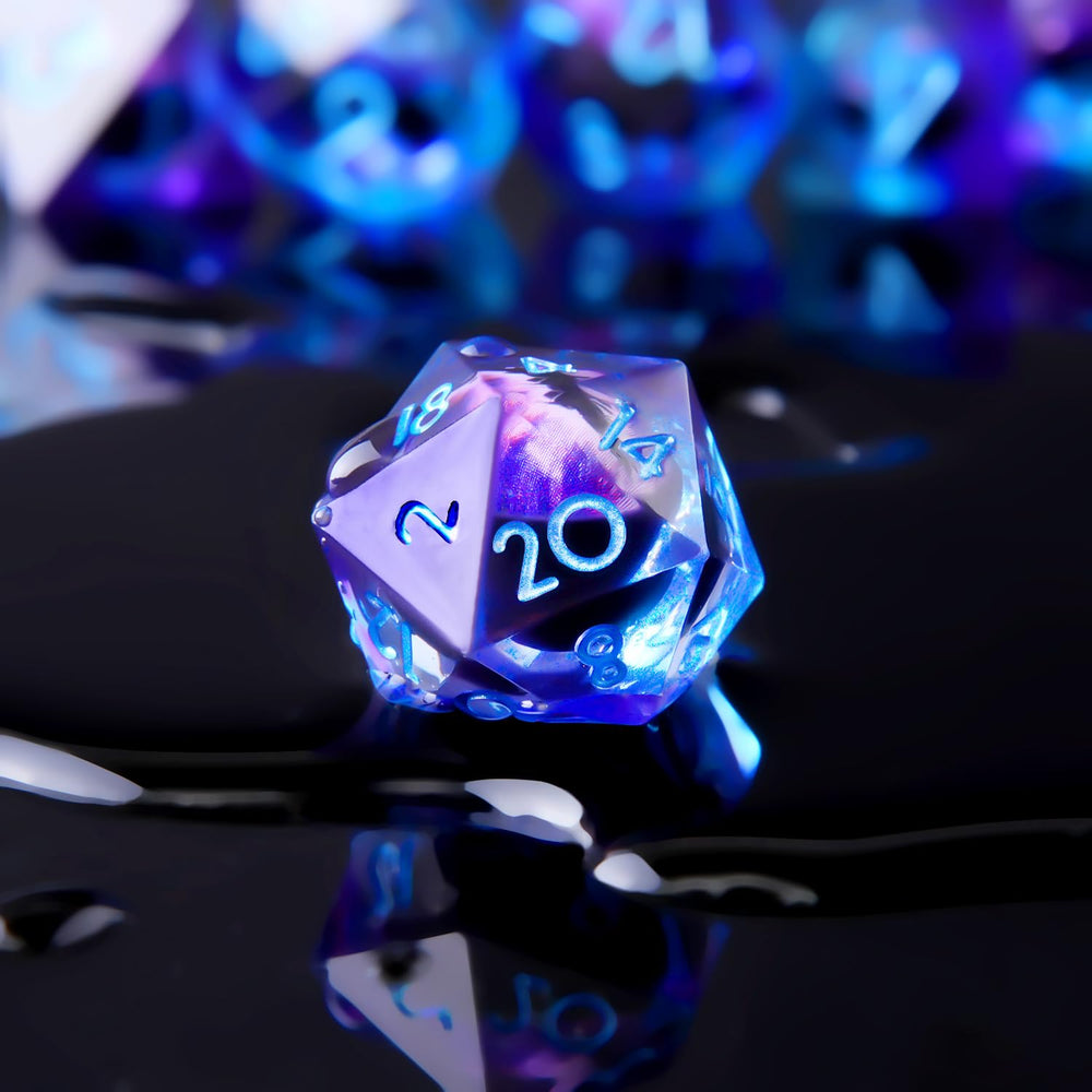 YEMEKO Dragon Eye liquid core dice, blue-purple glow during tabletop play.