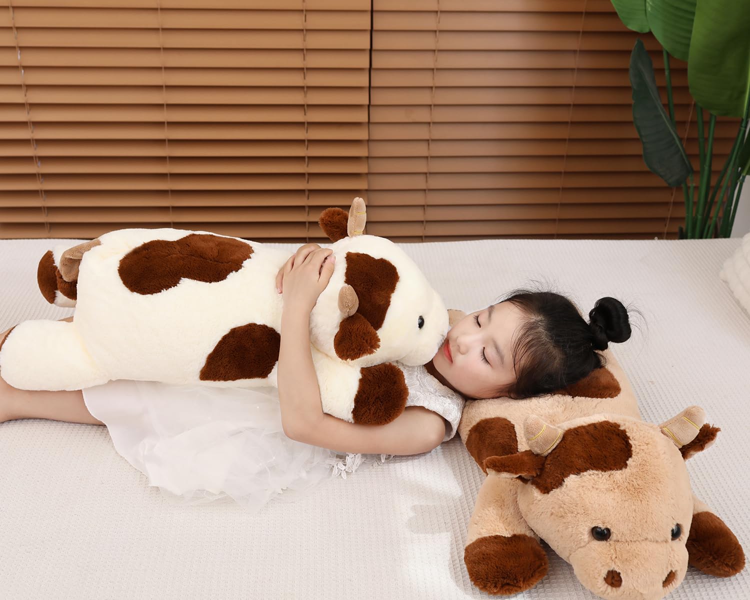 YESGIRL cow weighted plush vacuum packaging; pat and sun to recover shape.