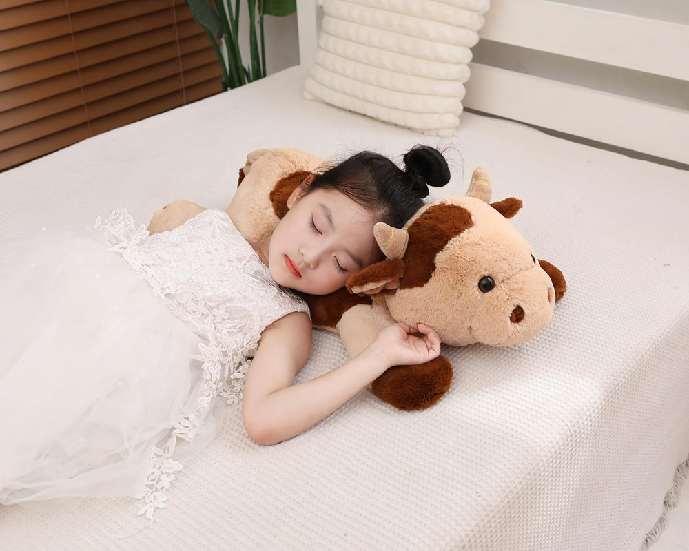 YESGIRL weighted cow plush in vacuum sealed packaging ready to expand after opening