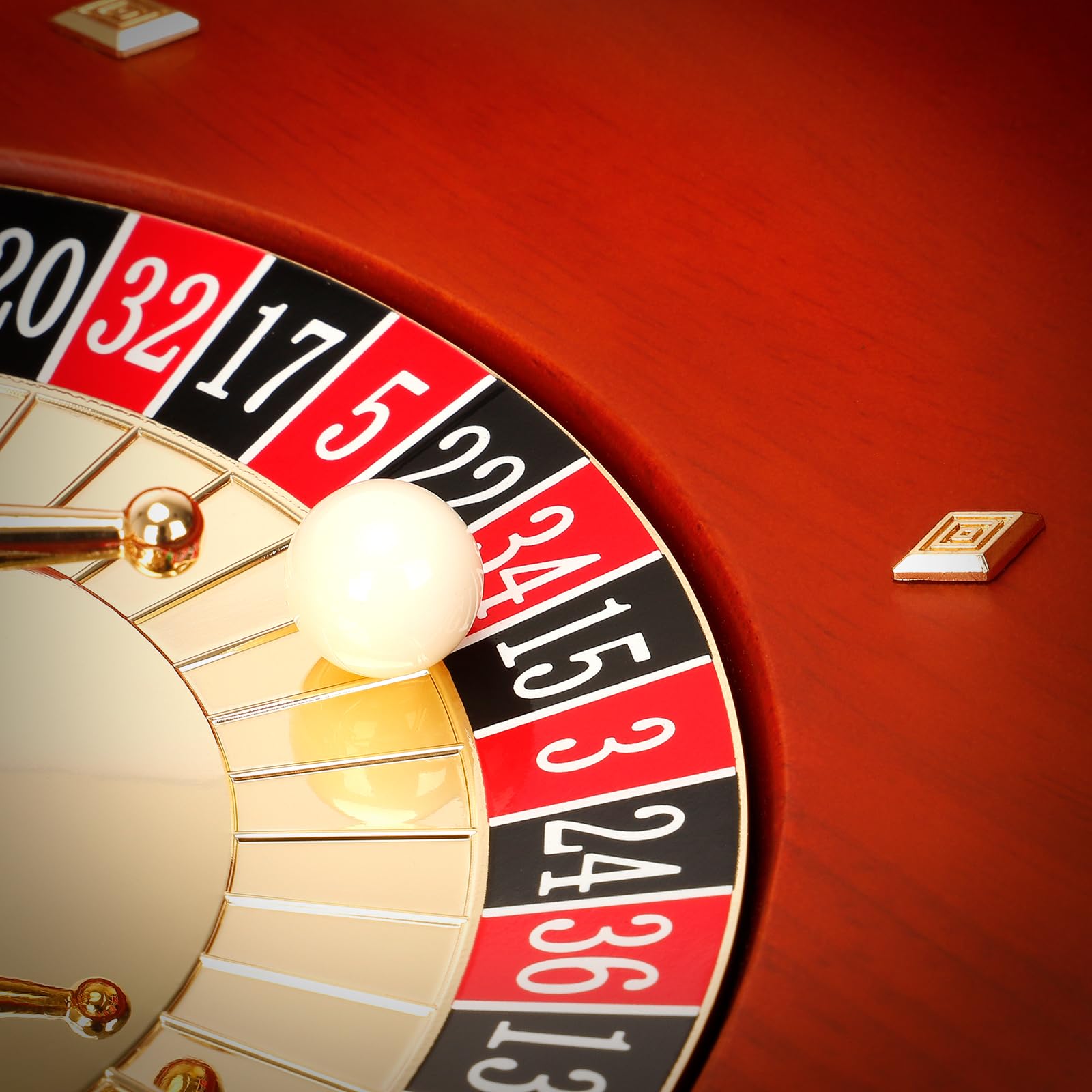 Ygebet 11-inch wooden roulette wheel in use for indoor and outdoor games.
