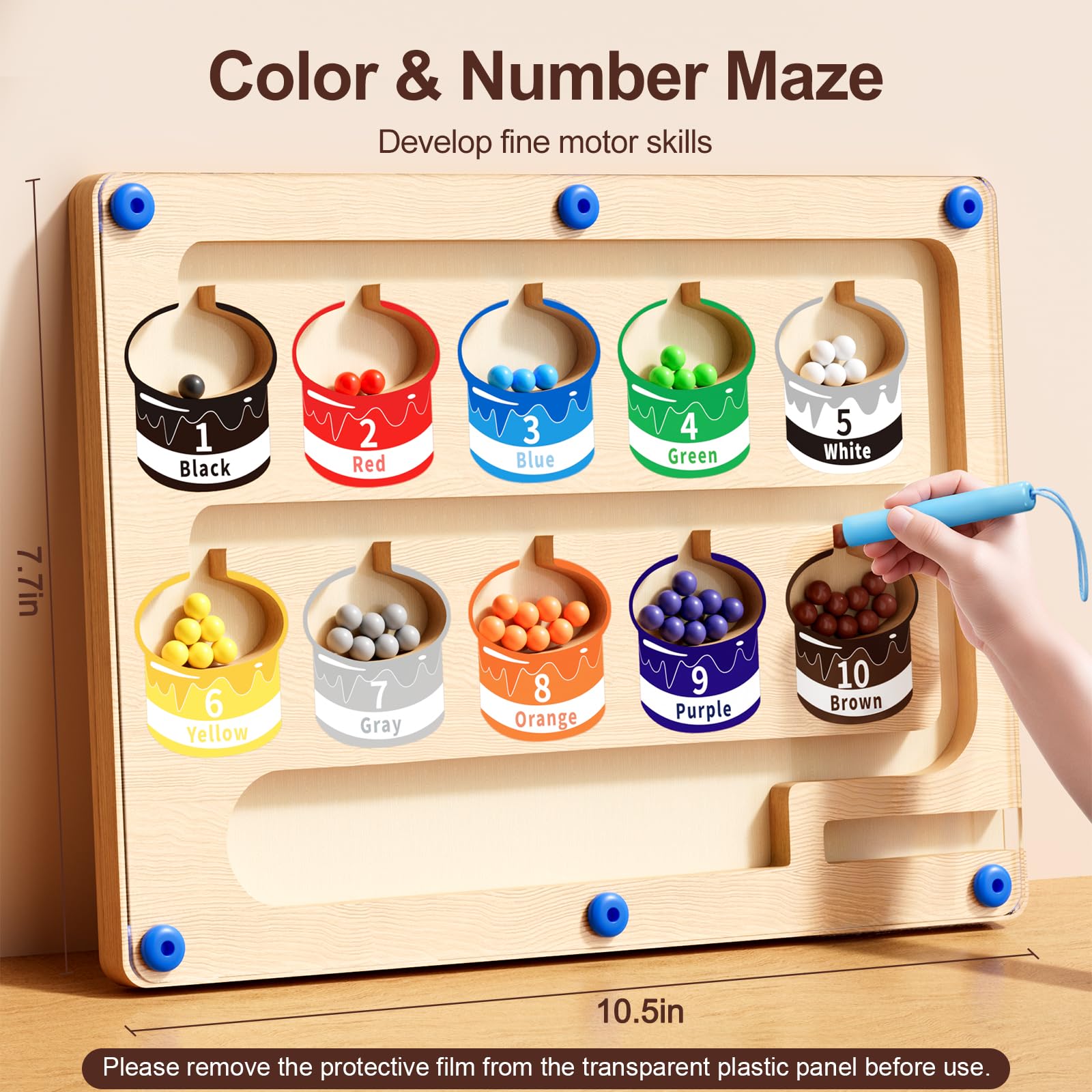 Yisryerow wooden wand and beads demonstrate fine motor control during play.