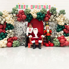 YMSZ Christmas arch color-scheme close-up with red, green, gold for a vibrant setup.