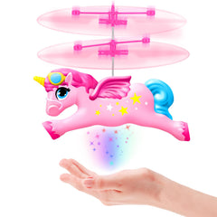 Ynanimery flying unicorn toy in hand-flight mode for beginner-friendly play.