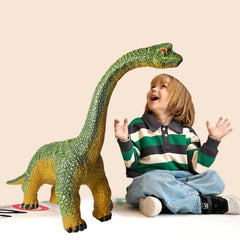 YONGJULE large dinosaur toy doubles as birthday party decor.