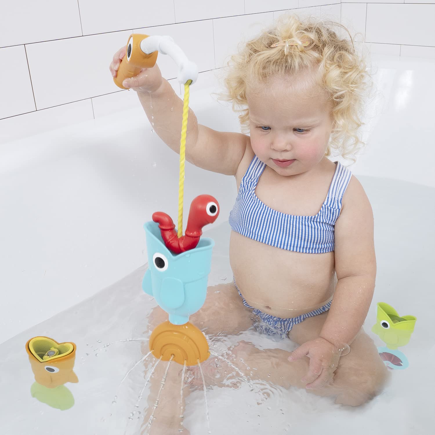 Yookidoo bath toy includes surprise mini fish to discover