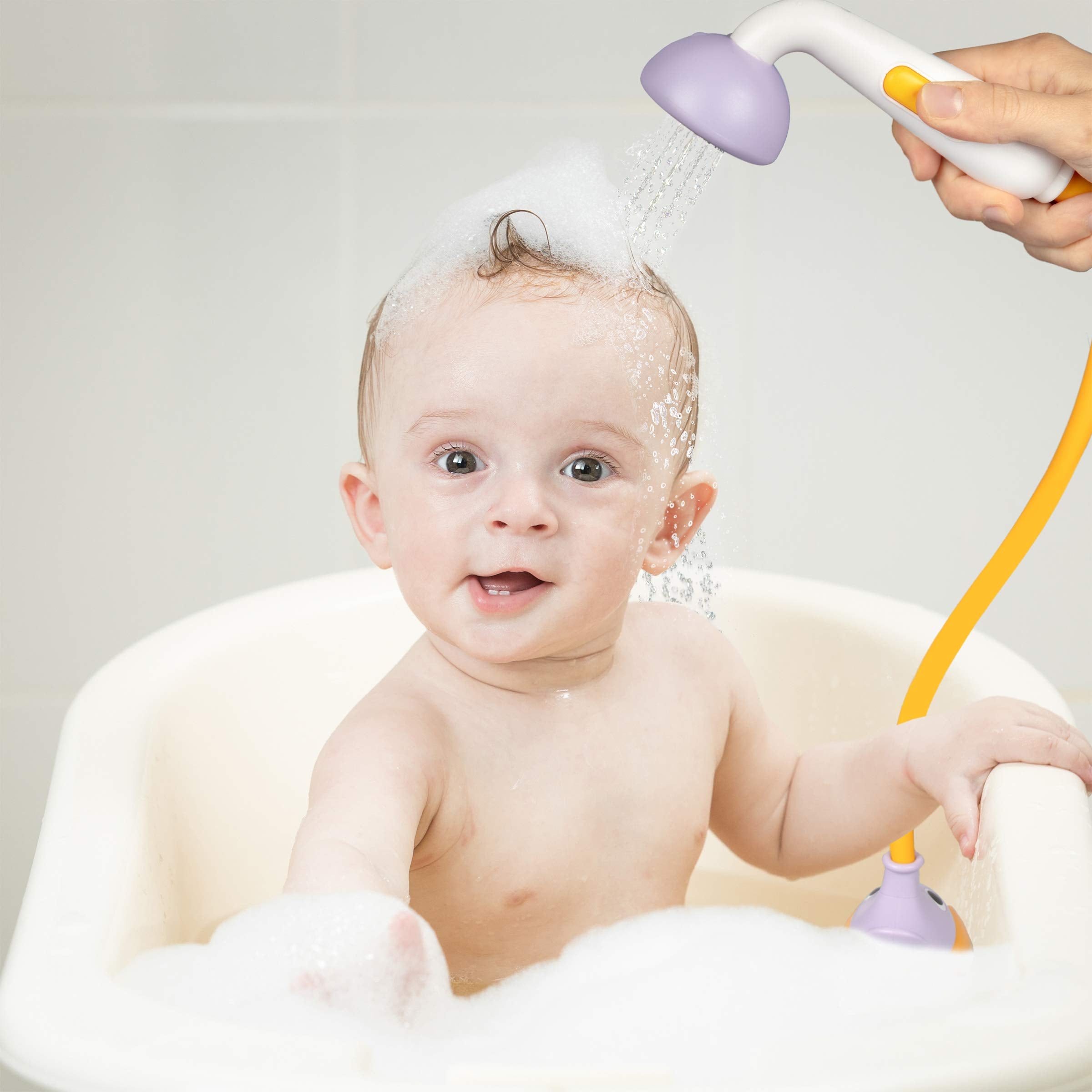 Close-up of Yookidoo two-knob flow control for adjustable water play.