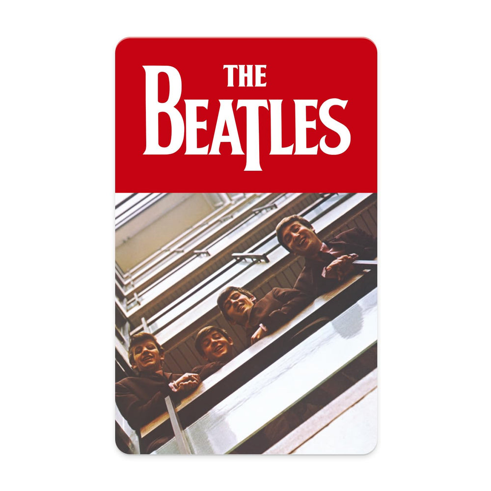 Yoto Beatles 1962-1966 card being inserted into a player for screen-free listening