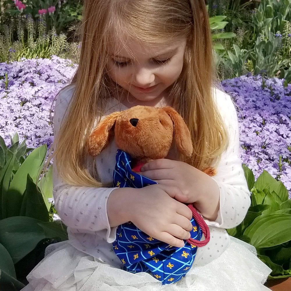 Madeline tote with Velcro closure to keep Genevieve secure