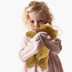 YOUBLEK weighted plush toy decor in cozy interior setting.