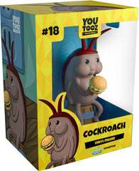 Youtooz cockroach figurine on a barrel for display