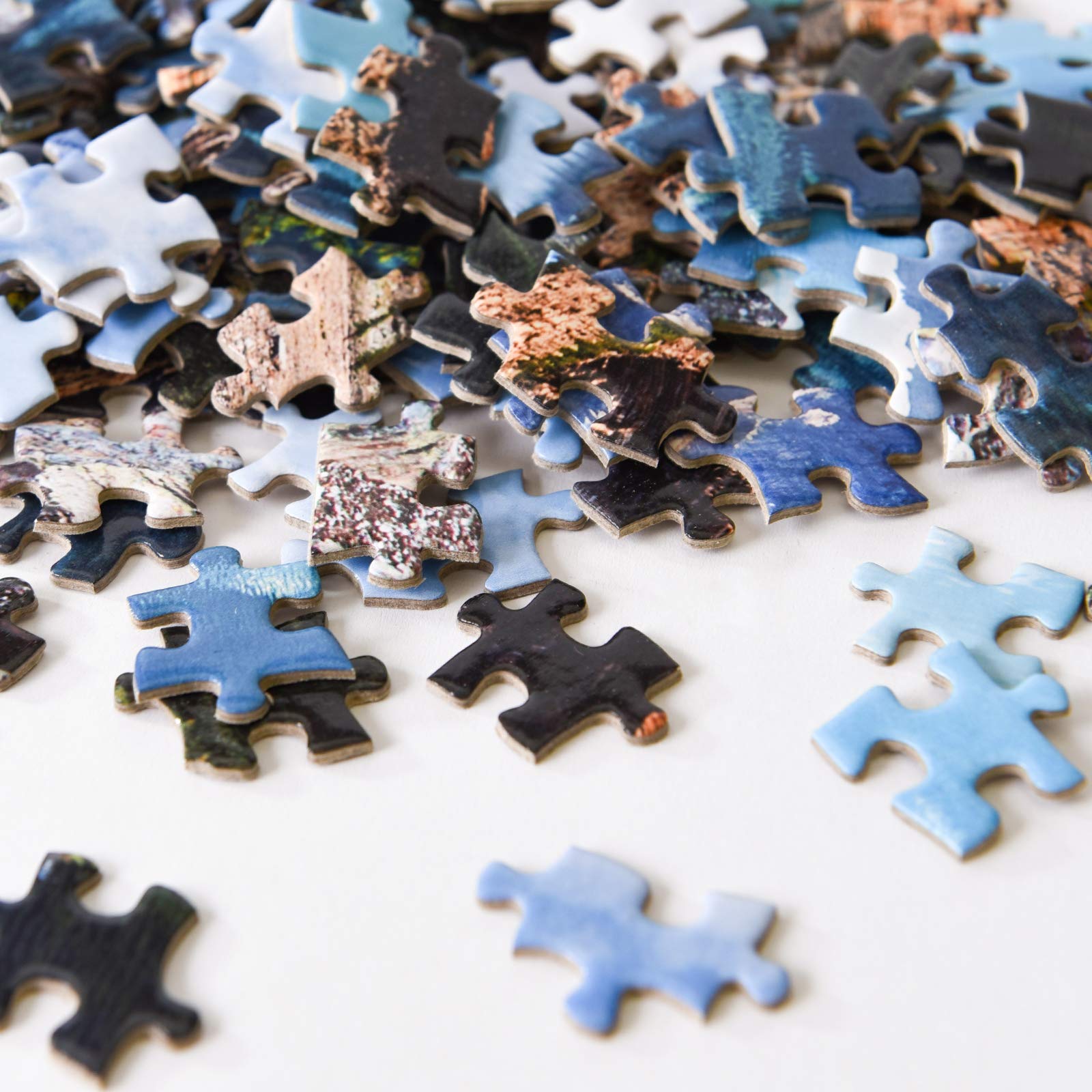 Close-up of Yundu Moraine Lake puzzle pieces highlighting thick, durable edges.