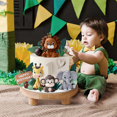 Zafena safari happy birthday sign brightens party cakes and cupcakes.