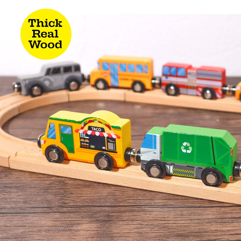 ZANY TRAINS taxi magnet boosts urban travel adventures on compatible wooden rails.