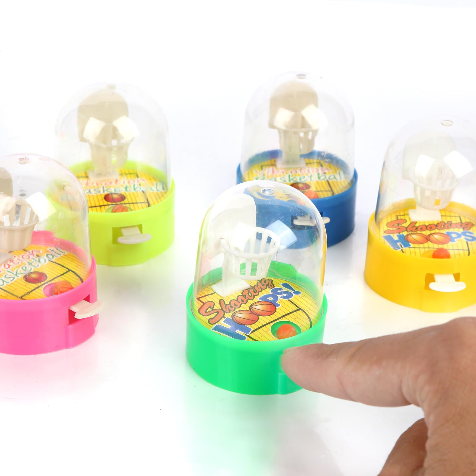 Zasnynua mini basketball toy in action, compact desktop entertainment for kids and families.