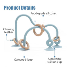 Zeeloopbee roller-coaster loop silicone teether in dusty blue stimulates hand-eye coordination