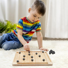 Zelbuck table-top magnetic game closeup showing durable wooden pieces.