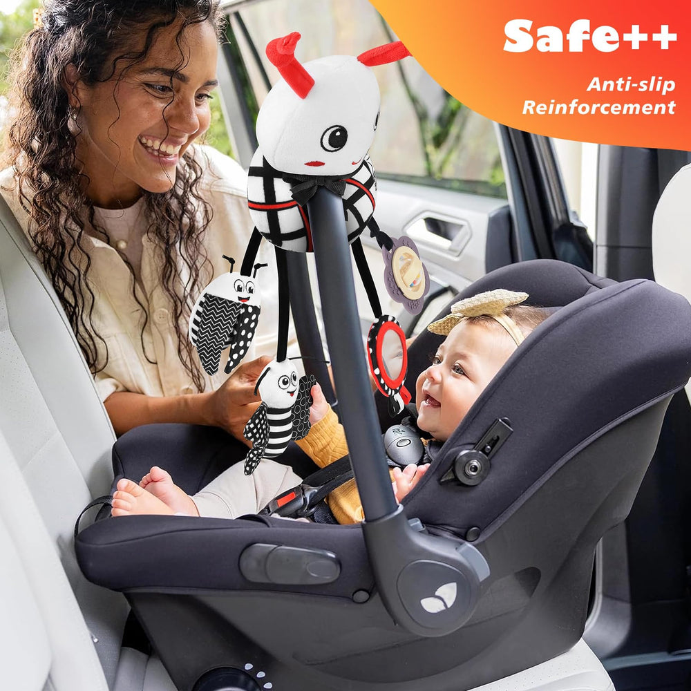 Zendstanding baby stroller activity with four pendants encouraging on-the-go exploration.