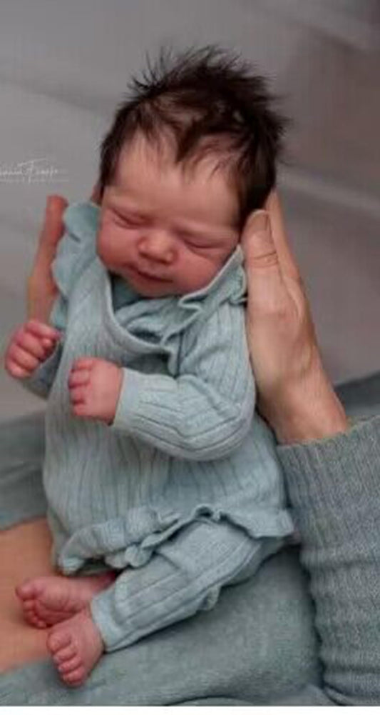 Zero Pam lifelike reborn baby doll with closed eyes and soft vinyl skin for cuddling