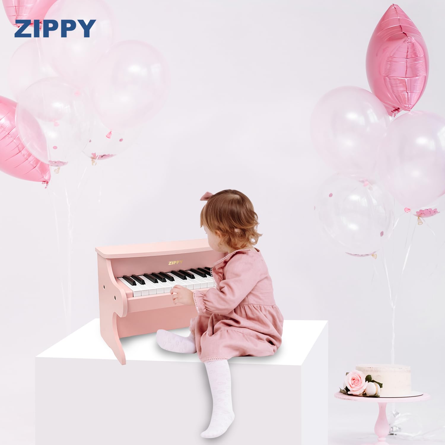 ZIPPY gift-ready wooden piano in pink for birthdays and screen-free fun.