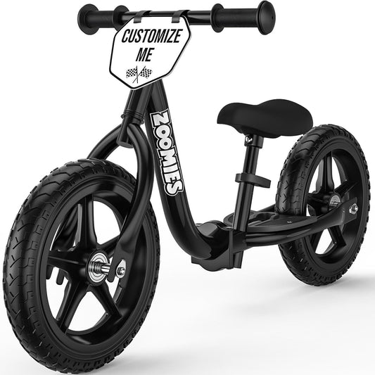 Zoomies folding 12 inch toddler balance bike folded for easy storage.